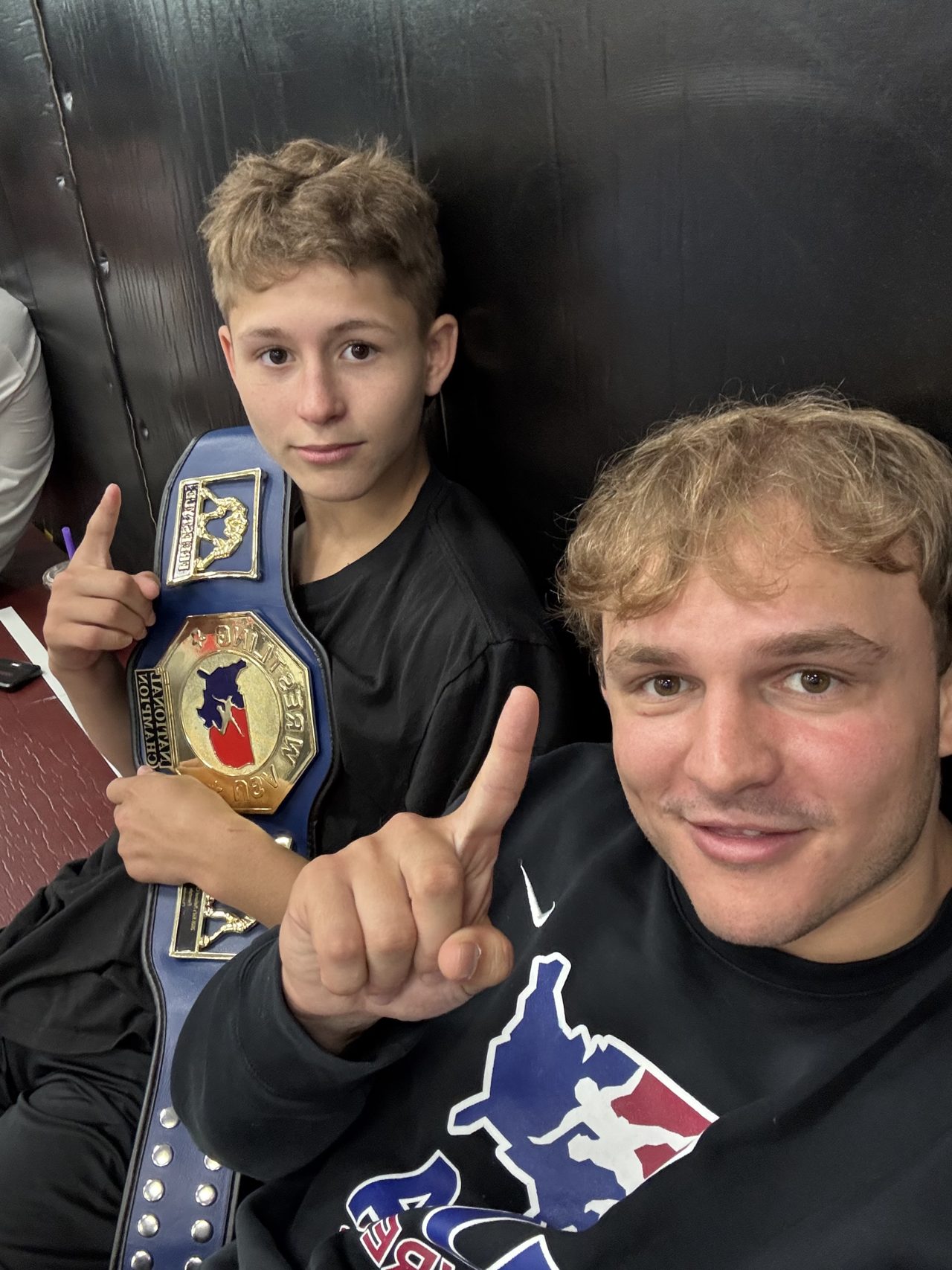 Coach Craig Manno with a Ruthless national champion athlete