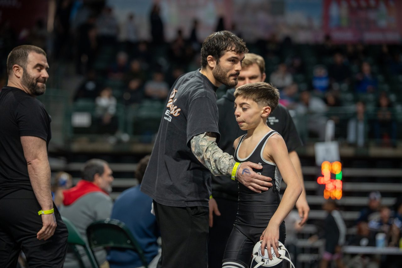 Coach Michael Cetta with a Ruthless athlete at a tournament