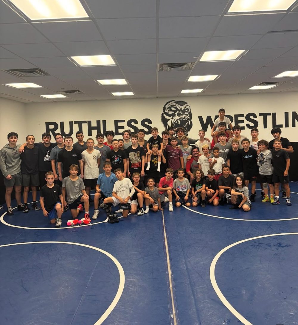 Ruthless Wrestling Club athletes training in the room